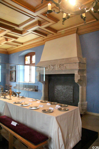 Fireplace & table set with silver & pewter pieces at Tucher Mansion Museum. Nuremberg, Germany.
