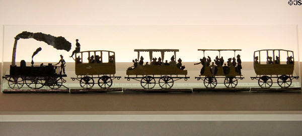 Cast tin toy model of first German train (1835) pulled by locomotive Adler at Nuremberg Transport Museum. Nuremberg, Germany.