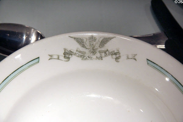 Porcelain plate from rail station restaurant Schwarzer Adler (c1900) at Nuremberg Transport Museum. Nuremberg, Germany.