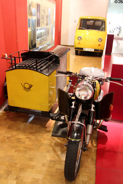 German BMW postal motorcycle (1957) & van at Museum of Communications in Nuremberg Transport Museum. Nuremberg, Germany.