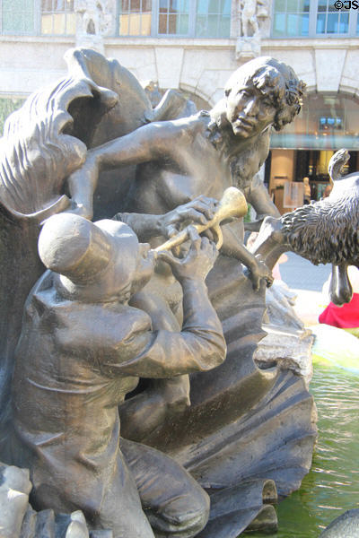 Wife with trumpeter detail on Marriage Carousel sculpture. Nuremberg, Germany.