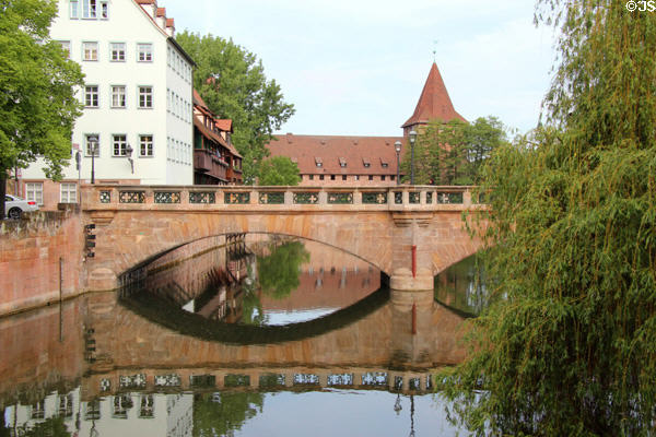 Max Bridge over Pegnitz River with Schlayer Tower beyond. Nuremberg, Germany.