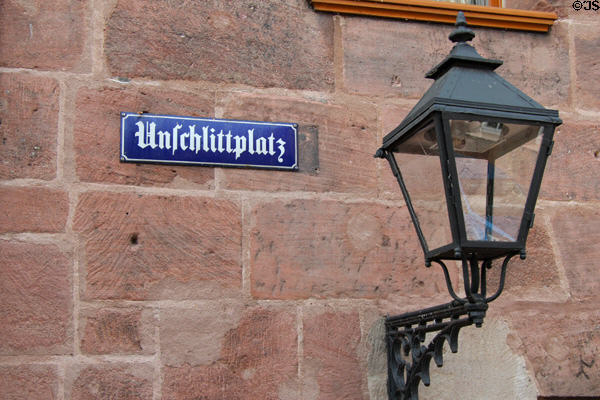 Street lamp & Gothic street sign near Pegnitz River. Nuremberg, Germany.
