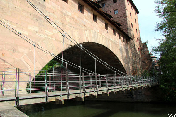 Kettenteg (1824) oldest suspension bridge in Germany above Pegnitz River. Nuremberg, Germany.