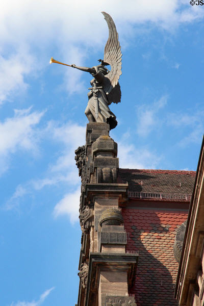 Horn-blowing angel atop Nürnberg Opera House. Nuremberg, Germany.