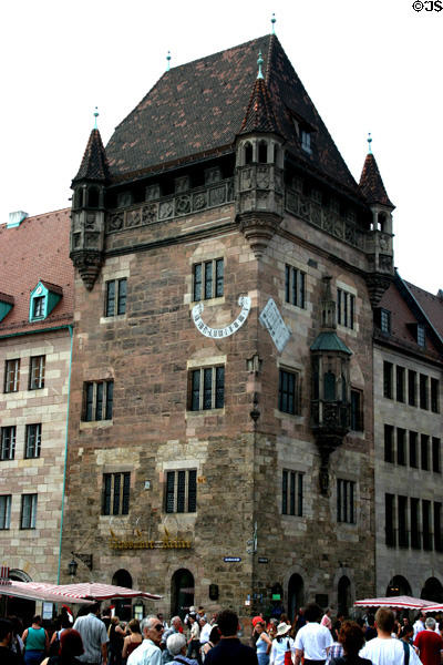 Nassauer Haus (12th-13thC) with sundial is only surviving Romanesque tower house on Karolinenstraße opposite St Lawrence church. Nuremberg, Germany.