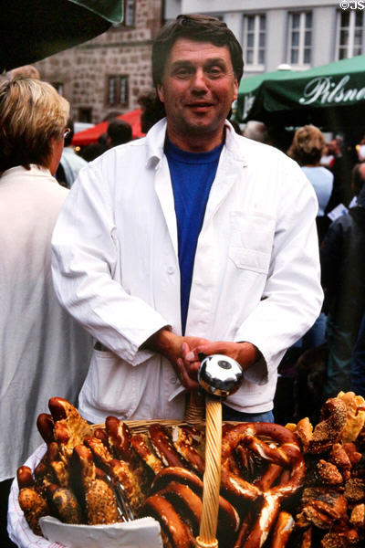 Bread & pretzel seller on marketplace. Marburg, Germany.