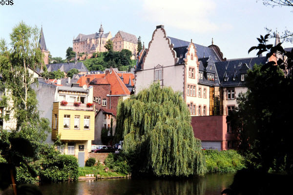 Marburg with Marburg Castle atop hill viewed from Lahn River. Marburg, Germany.