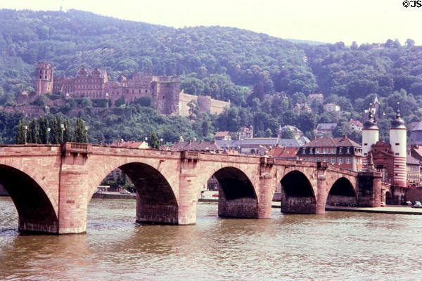 Alte Brücke (Old Bridge) (1786-88) over Neckar River with Heidelberg Castle in background. Heidelberg, Germany.