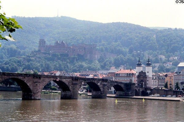Alte Brücke (Old Bridge) (1786-88) over Neckar River with Heidelberg Castle in background. Heidelberg, Germany.