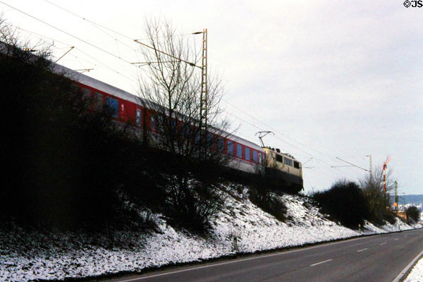 Electrified train with pantograph in German countryside. Germany.