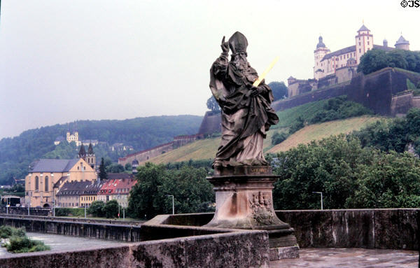 Statue of St. Kilian, an Irish missionary who was martyred in Würzburg, at Alte Mainbrücke (Old Bridge). Würzburg, Germany.