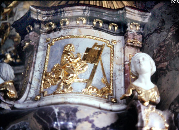 Detail of gilded decorative work - painter with his easel - in Hofkirche (royal chapel) at Residenz. Würzburg, Germany.