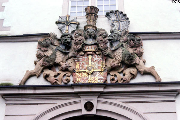 Coat of arms of the Teutonic Order over the doorway of Evangelical Castle Church. Bad Mergentheim, Germany.