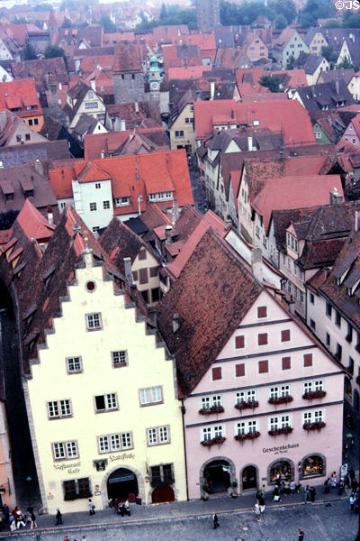 Buildings with steep roofs & stepped facade on market square viewed from city hall tower. Rothenburg ob der Tauber, Germany.