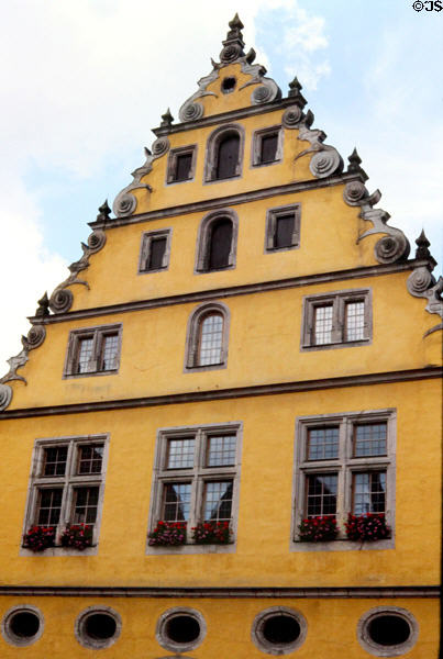 Façade of heritage Germanic style house with ornamentation along roof line in historic center. Dinkelsbühl, Germany.