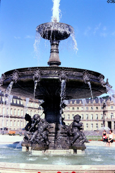 Fountain on Schlossplatz with Neues Schloss (new palace) (1746-1807) in background. Stuttgart, Germany.