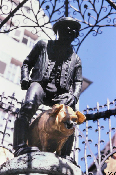 Lucky Hans fountain with statue of man straddling pig. Stuttgart, Germany.