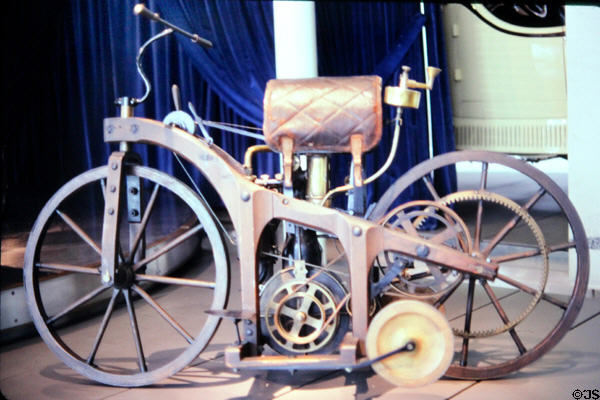 Daimler riding car (1885), world's first motorcycle at Mercedes Museum. Stuttgart, Germany.