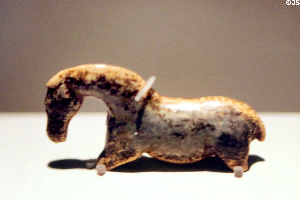 Paleolithic carving of horse (vogelherd horse) (35,000 yrs. old) at Castle Hohentübingen Museum of Ancient Cultures. Tübingen, Germany.