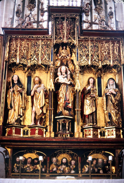 High altar (1493) with gilded Gothic sculptures of various saints & Madonna & Child centerpiece created by studios in Ulm. Blaubeuren, Germany.