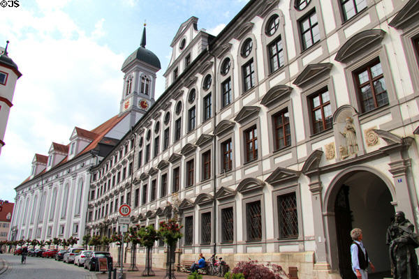 Studienkirche Mariä Himmelfahrt (1610-7) with clock tower over Academy for teacher training (1731-8). Dillingen, Germany.