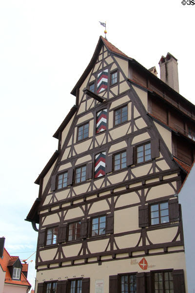 Siebendächer Haus (seven-roof house) (1601) with half-timbering & end-beam to hoist goods to upper levels was originally used by town's tanning trade. Memmingen, Germany.