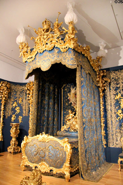 Ornately gilded bedroom set (1871) from Linderhof Palace at King Ludwig II Museum. Chiemsee, Germany.