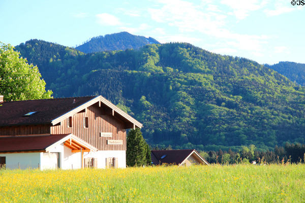 Farm building in alpine setting in Chiemsee region. Chiemsee, Germany.