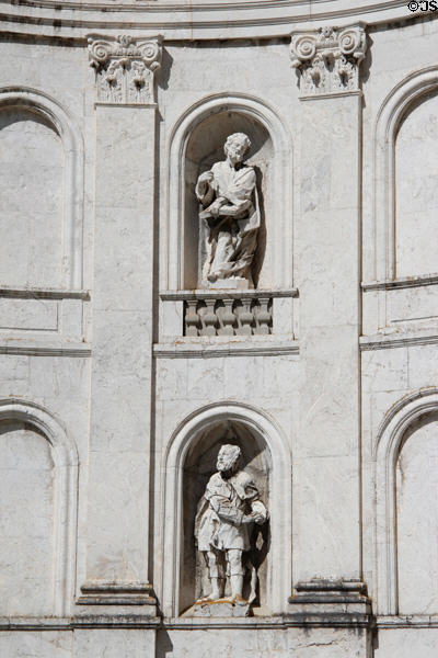 Apostles statues by Ägid Verhelst in niches on facade of Ettal Benedictine Abbey. Ettal village, Germany.