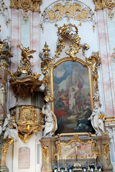 Baroque altar with painting of Christ with Holy Apostles at Ettal Benedictine Abbey. Ettal village, Germany.