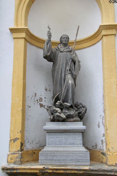 Statue of St Magnus of Füssen slaying a dragon at Basilica St Mang. Füssen, Germany.