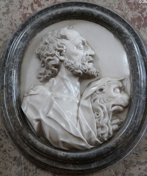 Marble carving of profile of Evangelist St Mark with his symbol, a lion, at Basilica St Mang. Füssen, Germany.