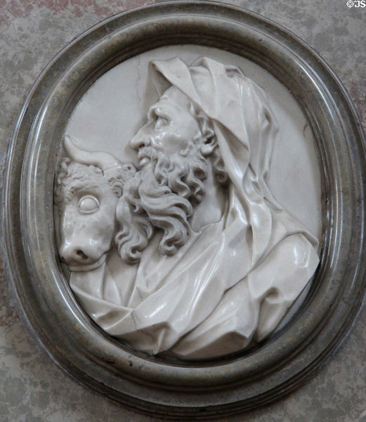 Marble carving of profile of Evangelist St Luke with his symbol, a bull, at Basilica St Mang. Füssen, Germany.