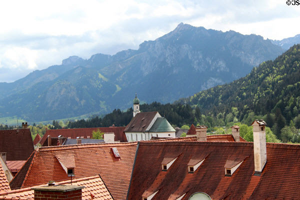 Roofs of Kloster St Mang with Alps in the background. Füssen, Germany.