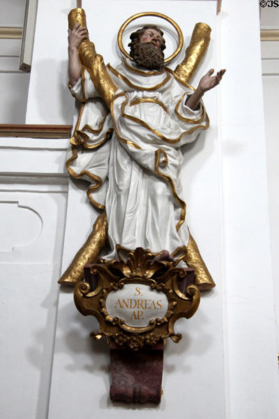Statue of St Andrew, Apostle, with his attribute, the x-shaped cross on which he was crucified at St Aegidius parish church. Gmund am Tegernsee, Germany.