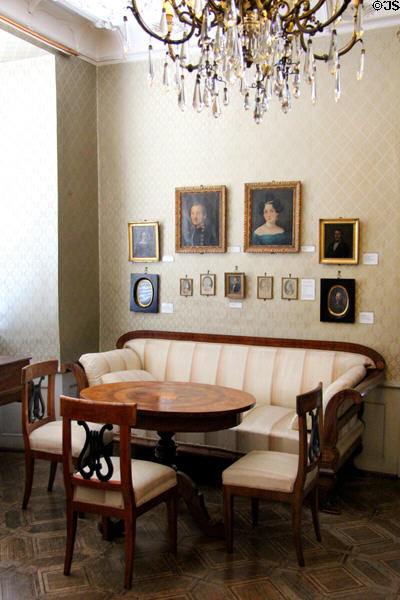 German inlaid round table (19thC) gallery with sofa & chairs at Lindau Municipal Museum. Lindau im Bodensee, Germany.
