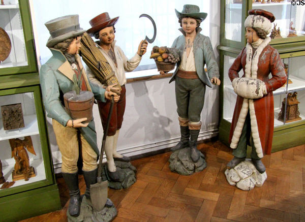 Carved figures in local dress at Oberammergau Museum. Oberammergau, Germany.