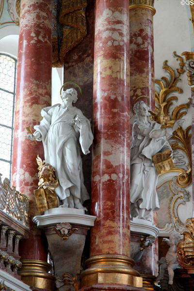 Baroque statues of evangelists Mark (with lion) & John (with eagle) at Wieskirche. Steingaden, Germany.