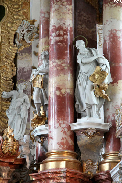 Baroque statues of evangelists Luke (with bull) & Matthew (with angel) at Wieskirche. Steingaden, Germany.