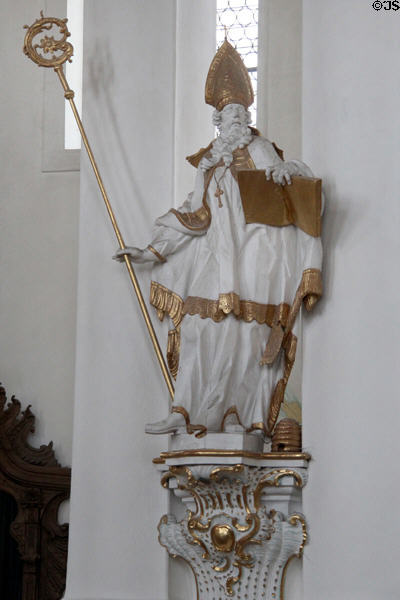 Statue of church father St Ambrose with symbol bee hive at Wieskirche. Steingaden, Germany.