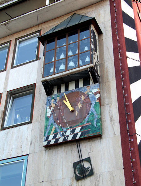 Wall clock with glockenspiel in Market Area. Ulm, Germany.