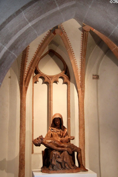 Pietà (Mary holding body of Christ) (c1430) carving by unknown artist at Ulmer Museum. Ulm, Germany.
