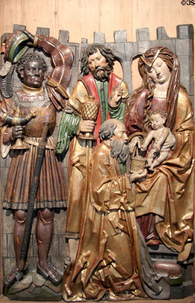 Carved Three Kings offering gifts to baby Jesus (c1515) by Niklaus Weckmann from Attenhofen at Ulmer Museum. Ulm, Germany.
