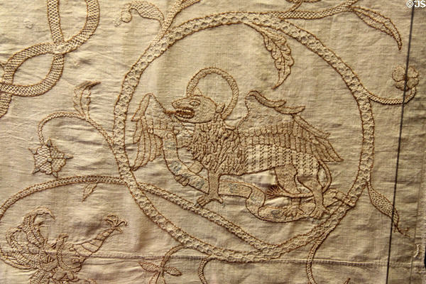 Winged lion symbol of Evangelist St Mark embroidered (1554) at Ulmer Museum. Ulm, Germany.