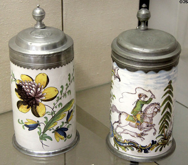 Ceramic covered beer steins with tin lids (c1800 & mid 18thC) by Crailsheim at Ulmer Museum. Ulm, Germany.
