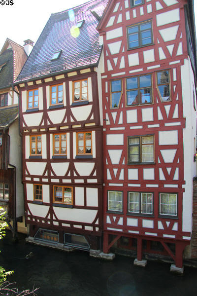 Half timbered buildings along narrow Blau River. Ulm, Germany.