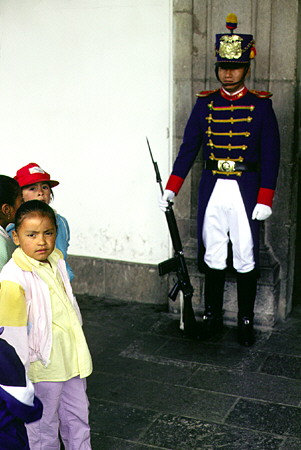 Presidential guard and children at Government Palace in Quito. Ecuador.
