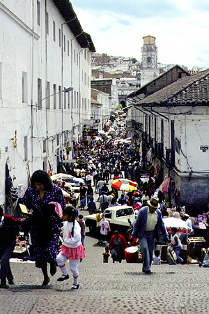 Market street along side of San Francisco Monastery in Quito. Ecuador.
