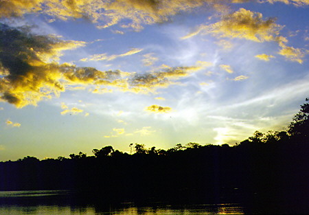 Sunset in the Amazon over Limoncocha Lake. Ecuador.